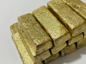 Raw gold bars